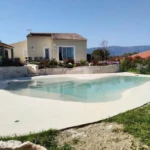 white sand beach entry pool